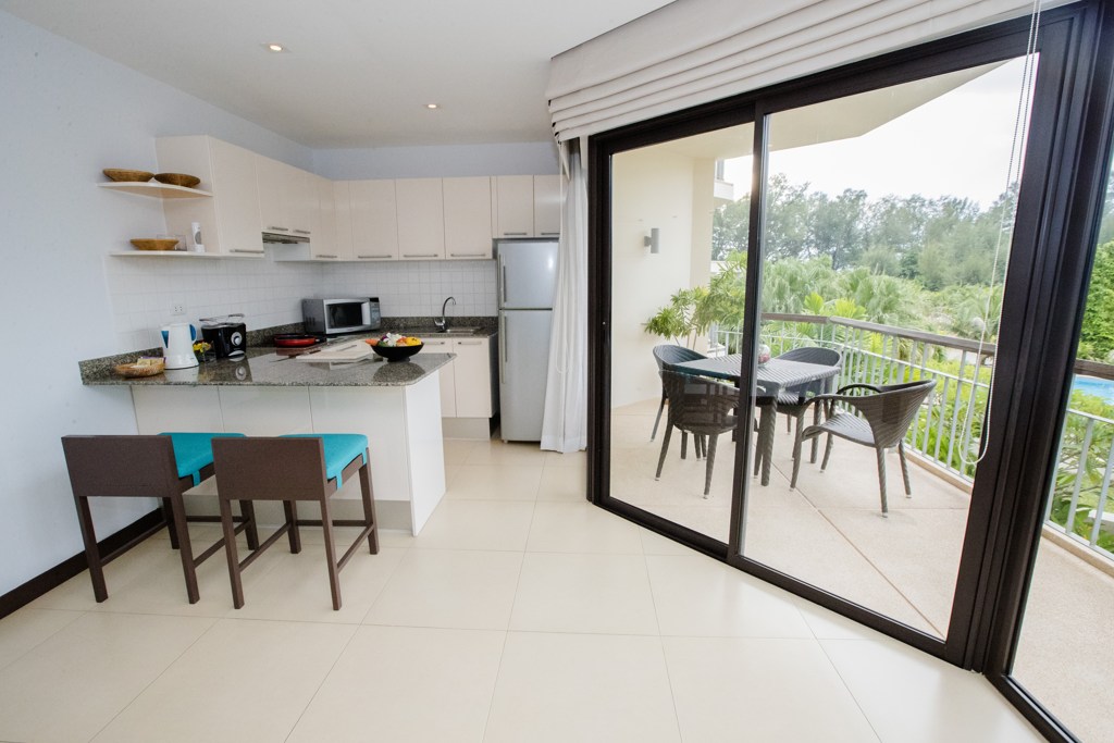 Dewa Phuket family suite kitchen and balcony view